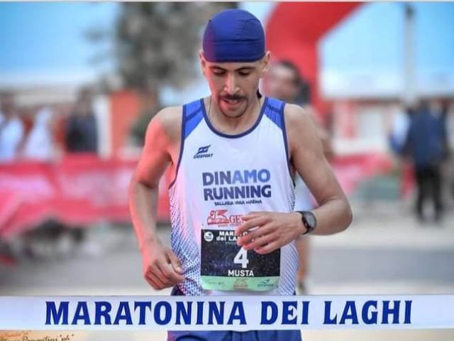 Maratonina dei Laghi tutta azzurra - Vincono Belghiti su De Nicolo e la Tamburi sulla Brazzoli  giornata purtroppo con pioggia e vento 